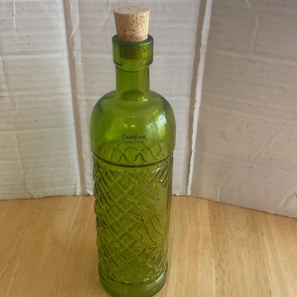 Beautiful green glass decorative or useful bottle. Made in Spain. NWOT.